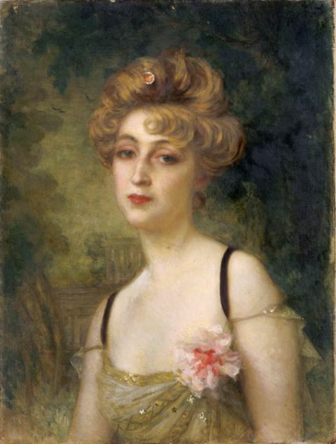 Cette image est un portrait peint de Rosemonde Gerard. Elle est montrée en buste, vêtue d'une robe légère avec des bretelles fines et une fleur au corsage. Ses cheveux clairs sont retenus dans une coiffure sophistiquée. Le portrait est d'Ernest Hébert