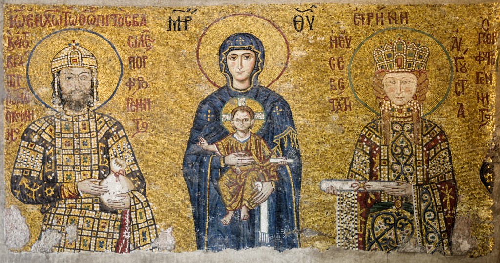 Cette image représente Jean II et son épouse Irène de Hongrie, entourant Marie et l'enfant Jésus. Ils sont vêtus d'habits riches, représentés sur fond d'or.